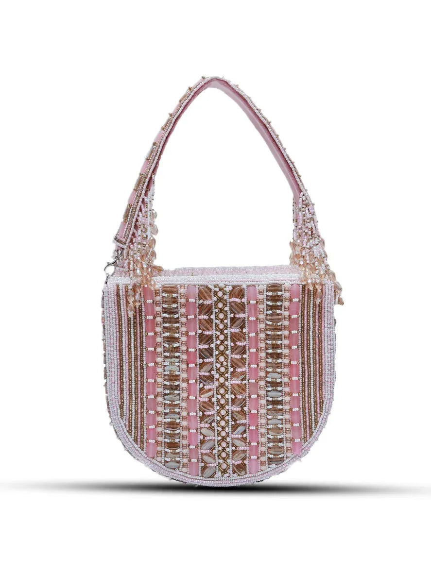 Pink Asma flap-over bag with handle from The Tan Clan, stylish and spacious for daily essentials.