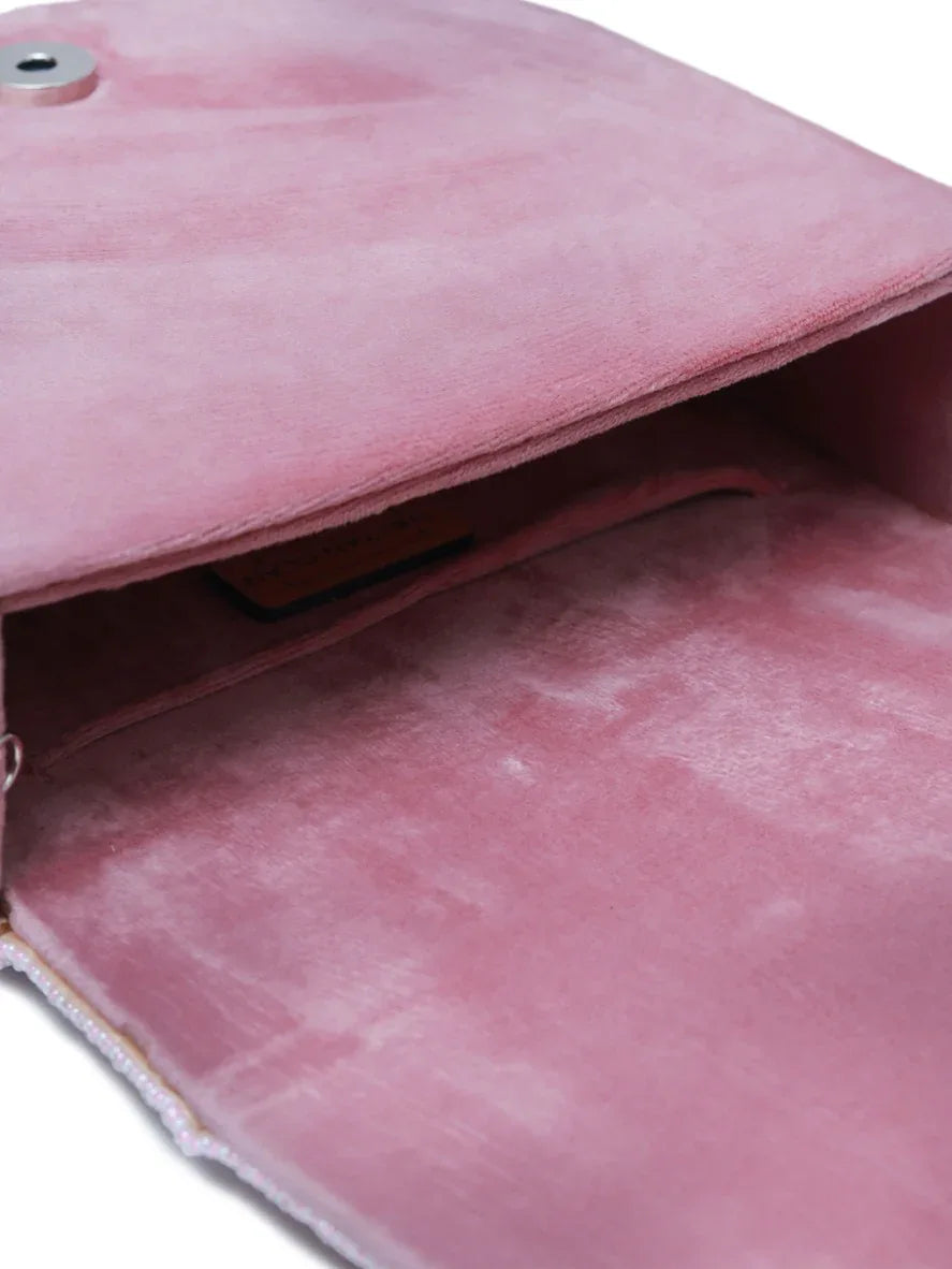Pink Asma flap-over bag with handle by The Tan Clan, featuring a stylish design and functional everyday use.