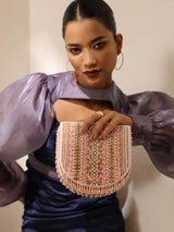 Pink Asma flap-over bag with handle by The Tan Clan, featuring a stylish design and secure closure.