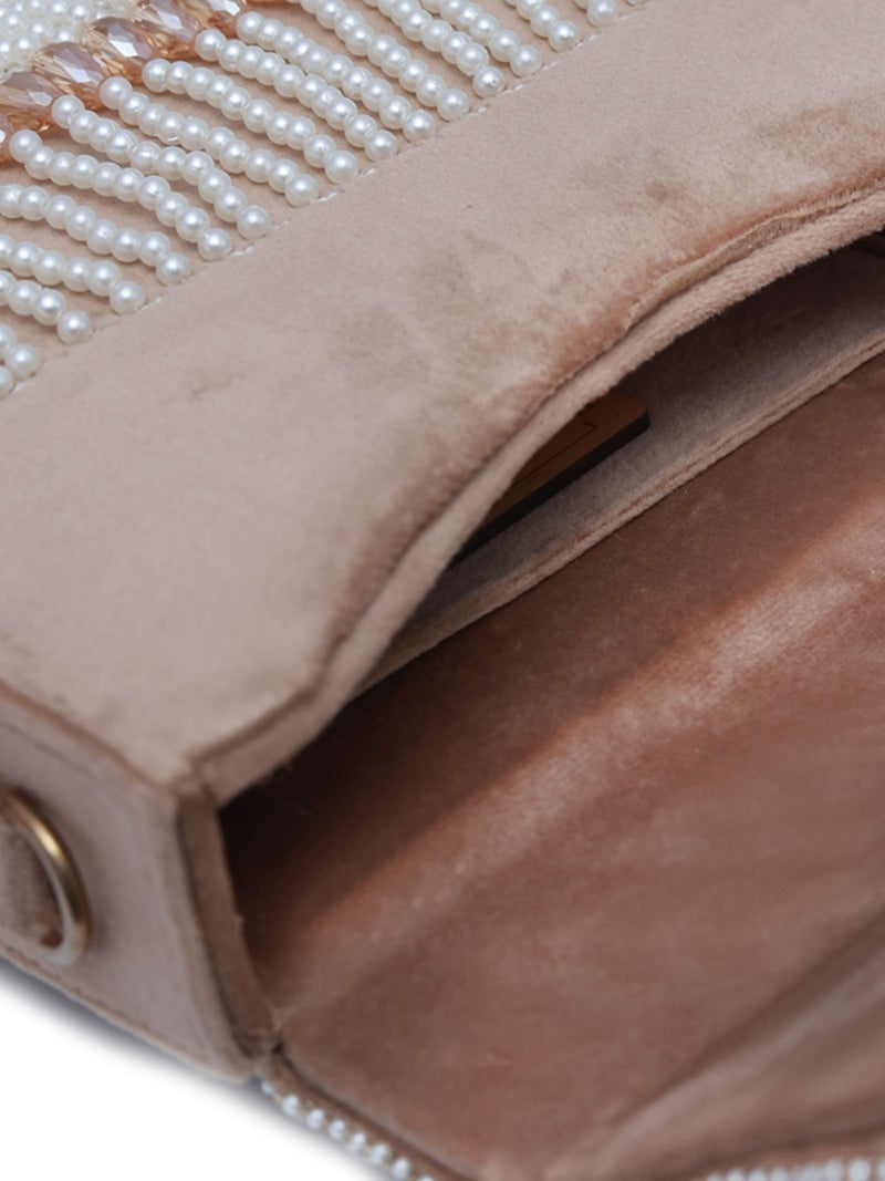 Beige Kiara flap-over bag with handle from The Tan Clan, featuring a sleek design and top handle for versatile style.