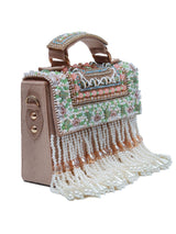 Beige Kiara flap-over bag with handle from The Tan Clan, featuring a stylish design and top handle for versatile carry.