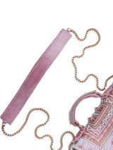 Pink Kiara flap-over bag with handle from The Tan Clan, showing its stylish design and soft leather material.