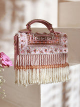 Pink Kiara Flap Over Bag with Handle by The Tan Clan featuring a stylish flap closure and top handle.