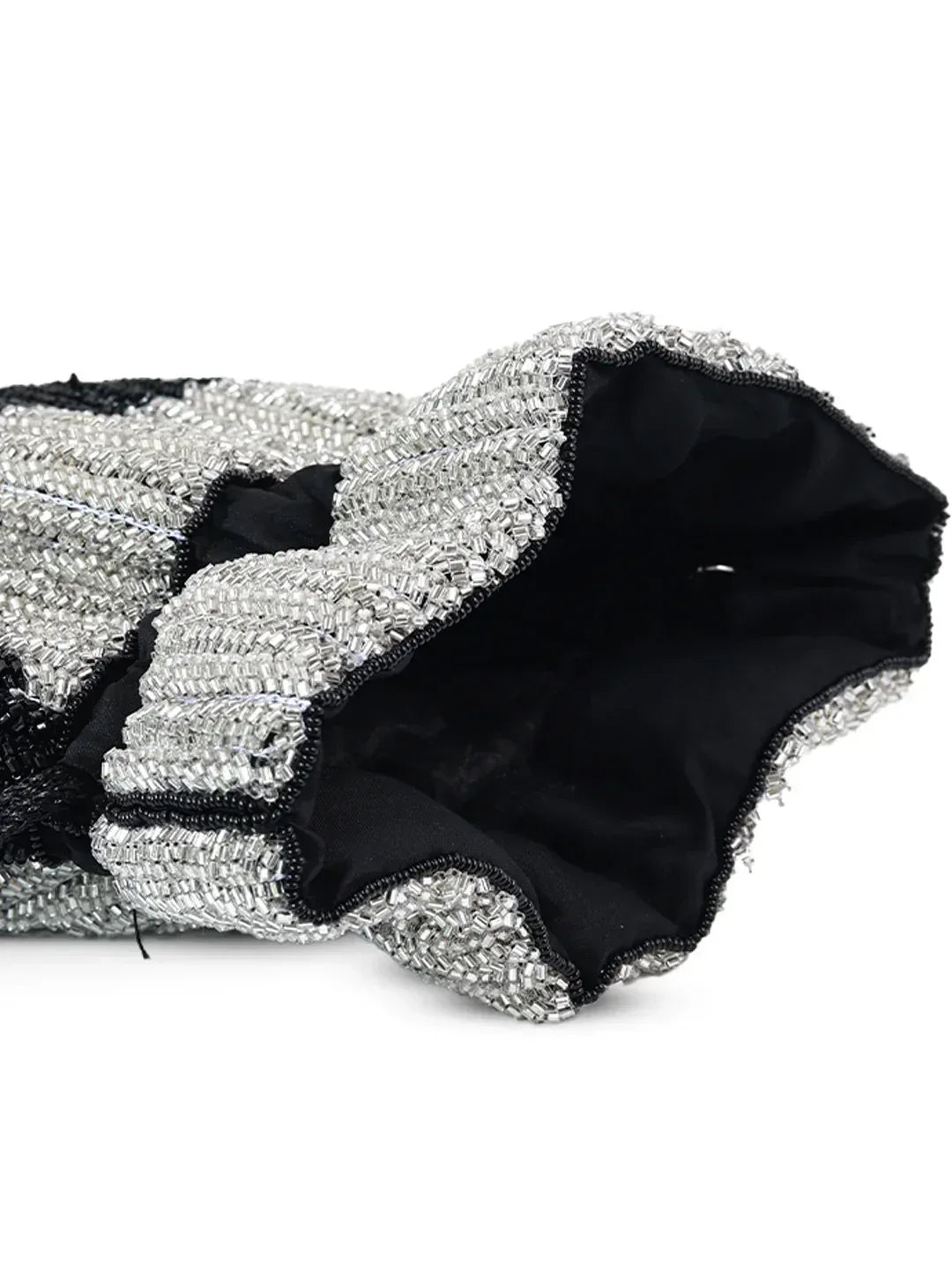 Aarna black Potli bag by The Tan Clan featuring traditional drawstring closure and elegant embroidery.