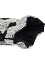 Aarna black Potli bag by The Tan Clan featuring traditional drawstring closure and elegant embroidery.