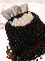 Aarna Black Potli Bag from The Tan Clan, elegant traditional purse with intricate embroidery and a drawstring closure.