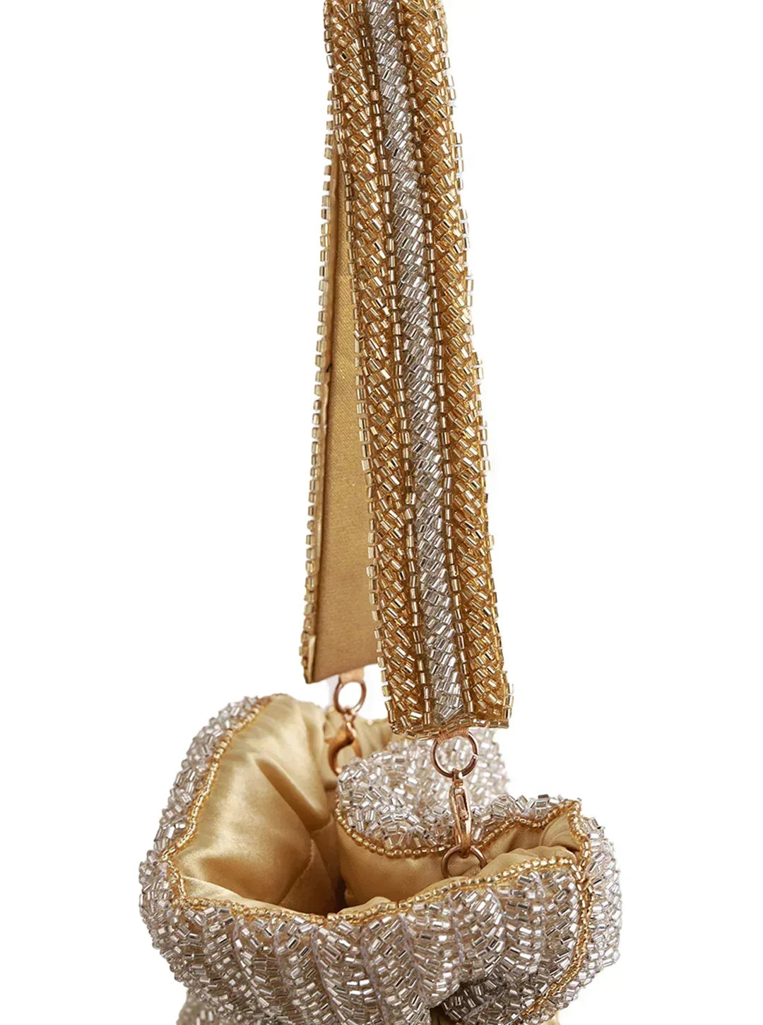 Aarna Gold Potli Bag by The Tan Clan, traditional embroidered potli bag with gold accents and drawstring closure.