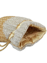 Aarna Gold Potli Bag from The Tan Clan, traditional embroidered potli purse with gold accents and drawstring closure.