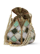 Ketki Lotus Potli bag by The Tan Clan featuring a pearl handle and intricate lotus design, perfect for traditional occasions.