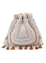 Nora beige tasselled potli bag by The Tan Clan featuring intricate embroidery and a drawstring closure with tassels.