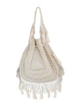 Nora white tasselled potli bag from The Tan Clan featuring traditional design and decorative tassels, perfect for festive occasions.