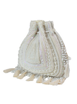 White tasselled Potli bag by The Tan Clan featuring intricate design and traditional drawstring closure.