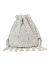 Nora white tasselled potli bag by The Tan Clan featuring traditional design with decorative tassels and elegant fabric.
