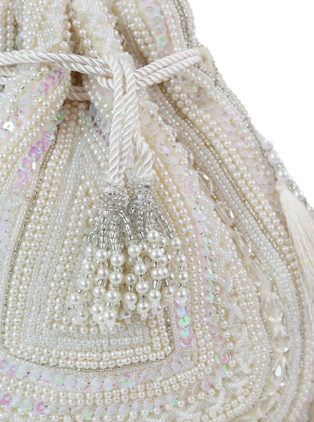 Nora white tasselled Potli bag by The Tan Clan featuring intricate design and decorative tassels, ideal for traditional occasions.