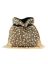 Rimsha black pearl potli bag with tassels from The Tan Clan, featuring intricate pearl embellishments and drawstring closure.