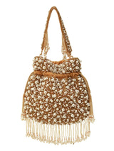 Rimsha Golden Pearl Potli Bag with Tassels from The Tan Clan, featuring intricate pearl detailing and decorative tassels.