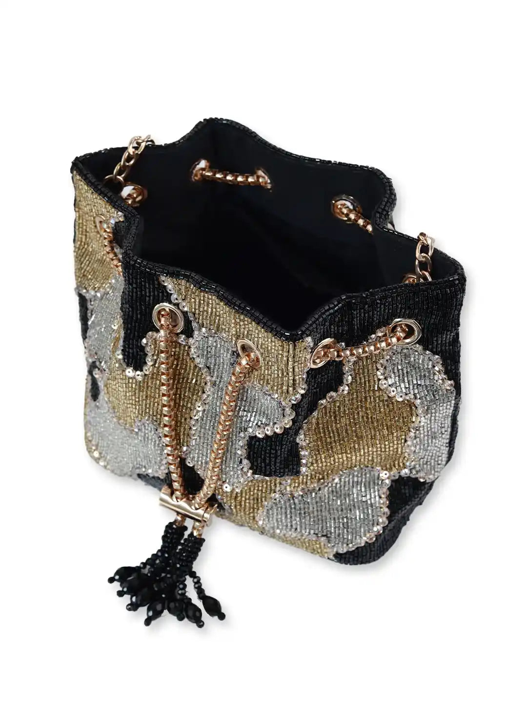 Black Terra bucket bag from The Tan Clan Potli Bags collection, featuring a traditional drawstring closure and handcrafted design.