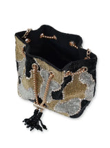 Black Terra bucket bag from The Tan Clan Potli Bags collection, featuring a traditional drawstring closure and handcrafted design.