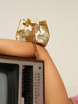 White Terra Bucket Bag by The Tan Clan, stylish potli bag with drawstring closure and decorative embellishments.
