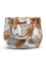 White Terra bucket bag by The Tan Clan, stylish potli bag with traditional drawstring closure and elegant design.