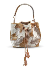 Terra white bucket bag by The Tan Clan, stylish potli bag with a textured design and drawstring closure.