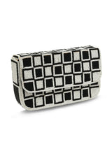 Checkered Blake Shoulder Bag by The Tan Clan featuring a stylish design and adjustable shoulder strap.