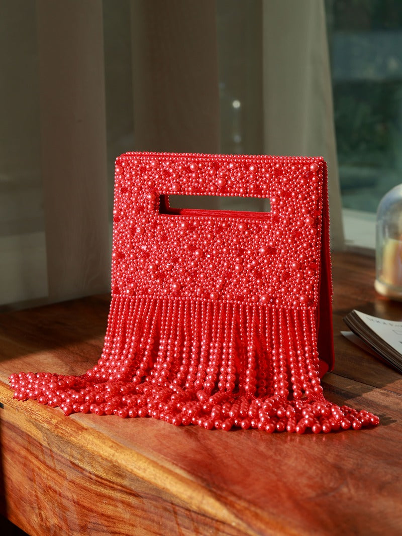White Ruby Embellished Flap Over Clutch Bag by The Tan Clan, featuring sparkling ruby accents and elegant design.