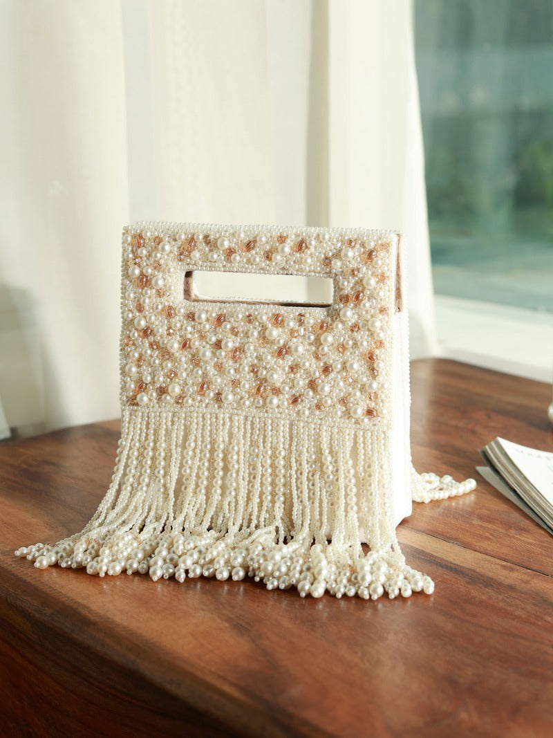 White Ruby Embellished Flap Over Clutch Bag by The Tan Clan with sparkling ruby accents and elegant design.