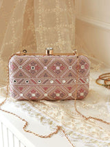 White Ariba box clutch by The Tan Clan, featuring a sleek rectangular design with a minimalist aesthetic and gold-tone clasp.