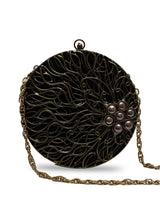 Vana Brass Clutch by The Tan Clan featuring a sleek brass design and elegant clasp, perfect for stylish evenings.